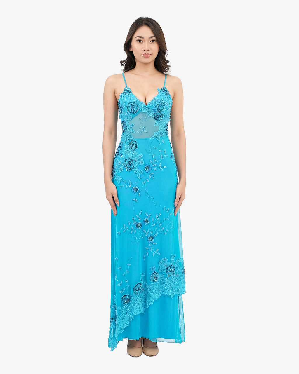 Woman wearing a Turquoise lace dress on a white background